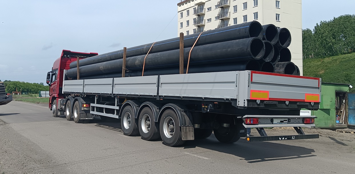 Услуги по перевозке труб большого диаметра трубовозами и автомобилями с кониками в Ненецком АО